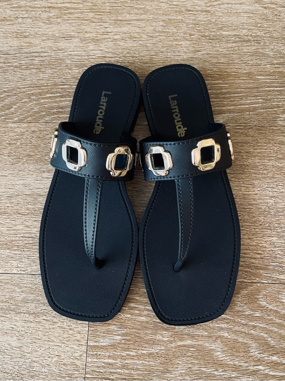 Larroude Black Sandal Thongs with Gold Buckle Detail